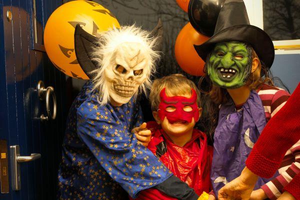 Children dressed up in spooky costumes for Halloween